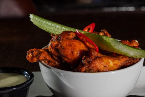 MKI Chicken wings served traditional or boneless