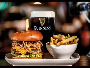 MKI classic beef burger with crispy smoked bacon melted cheese crispy onion strings